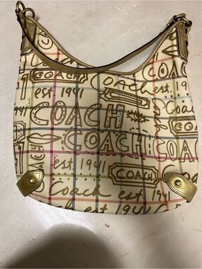 Coach Cream Signature Script Hobo Bag with Gold Trim